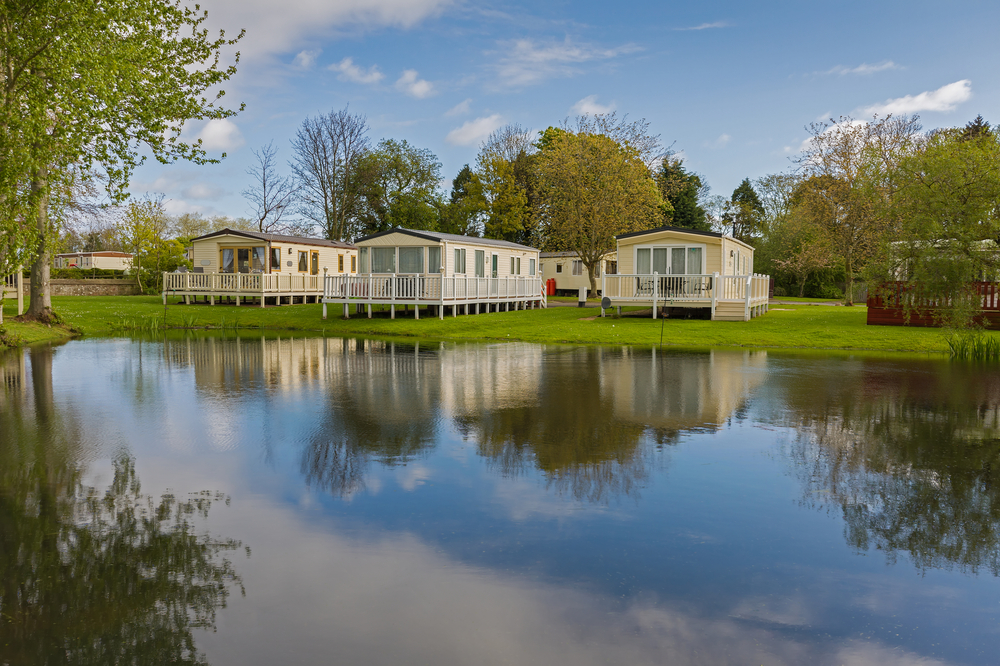 Caravans on the waterfront at North Lakes, representing the benefits of Solway coast caravan parks.